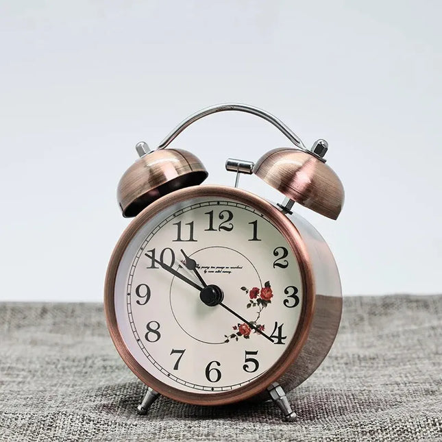 Vintage Glockenwecker mit floralem Zifferblatt