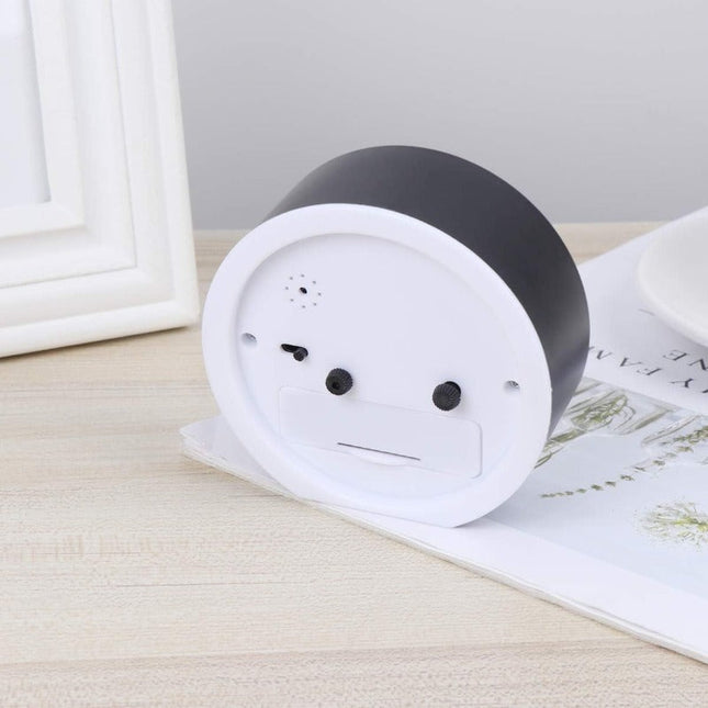 Kleiner runder Analogwecker batteriebetrieben