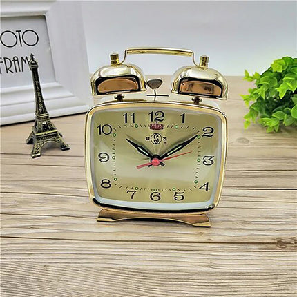 Kleiner mechanischer Wecker in Gold