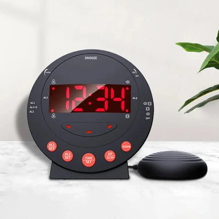 Schwarzer Vibrationswecker mit Vibrationskissen